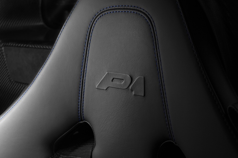 Illustration for article titled The McLaren P1 Farewell Is Dressed In Stunning Naked Blue Carbon